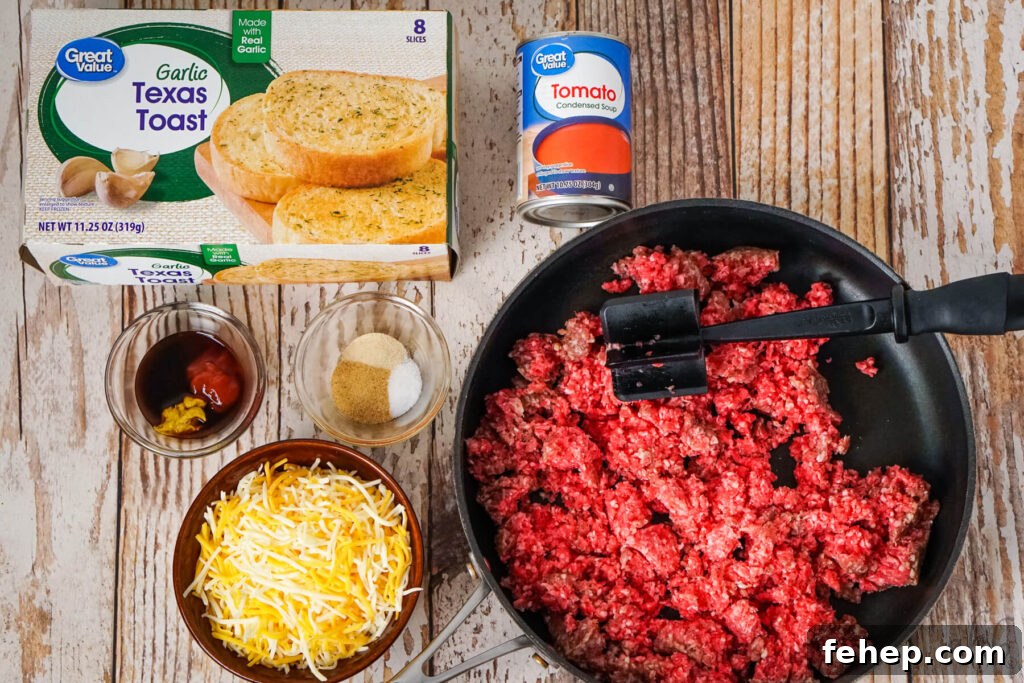 Garlic Bread Sloppy Joes: Cheesy, Savory Sloppy Joe Twist 5 A box of Garlic Texas Toast, Condensed Tomato soup, Worcestershire sauce, yellow mustard, and ketchup, onion powder, salt, and garlic powder, shredded colby jack cheese, and broken up raw ground beef sitting in a medium black skillet.