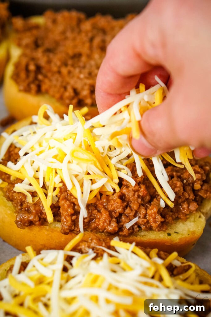 Garlic Bread Sloppy Joes: Cheesy, Savory Sloppy Joe Twist 8 Shredded colby jack cheese is added to the garlic bread and meat mixture.