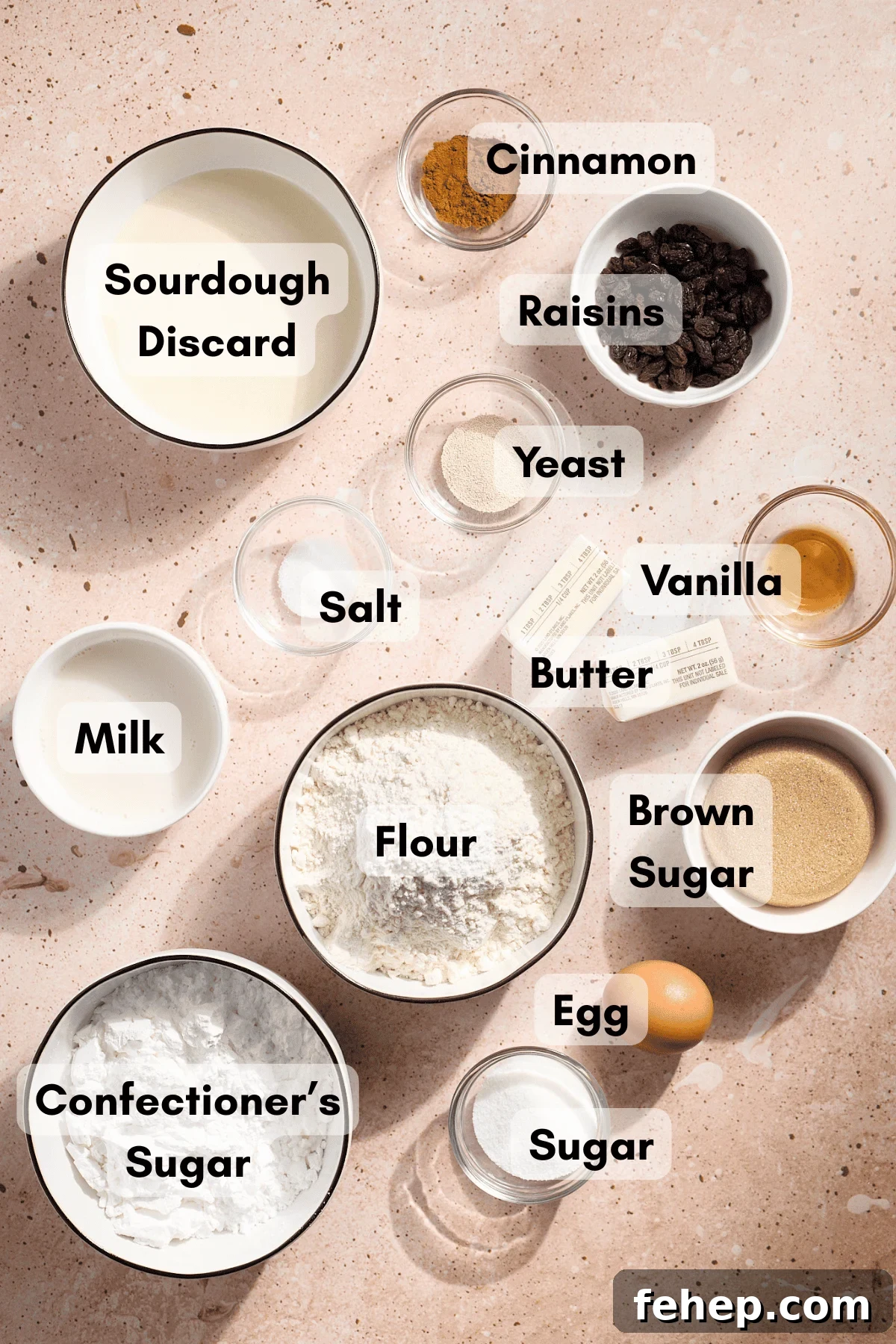 Ingredients for Sourdough Discard Cinnamon Roll Pull Apart Bread in small bowls. 