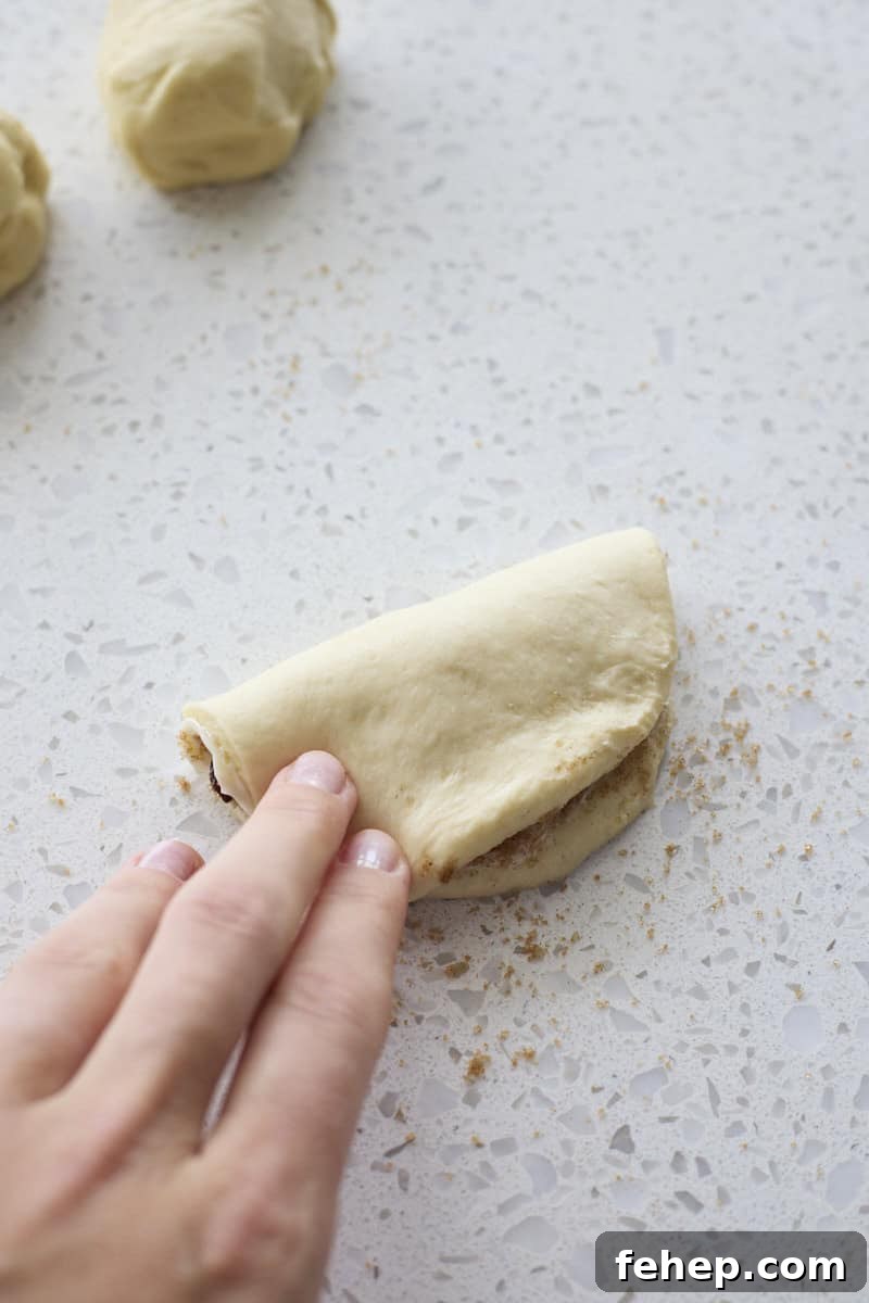 Dough piece folded in half.