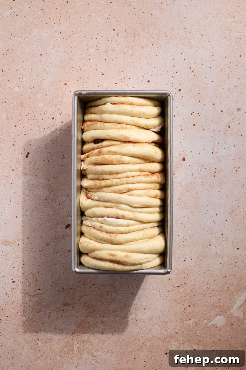 Sourdough Discard Cinnamon Roll Pull Apart Bread in the baking pan before baking.