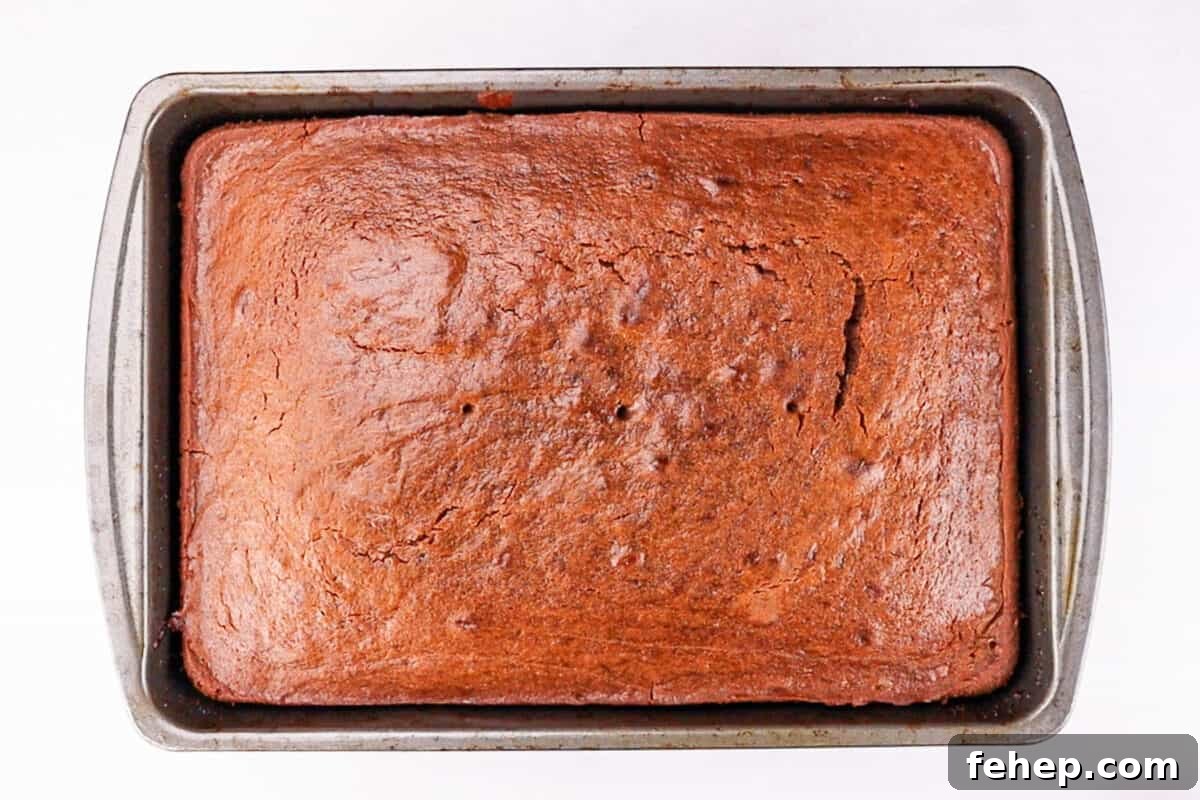 Gingerbread Trifle Recipe: Festive Layered Dessert for Holidays 11 gingerbread cake after baking, in large baking dish.