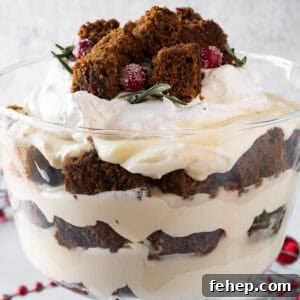Gingerbread Trifle in Trifle dish showing beautiful distinct layers of cake, pudding, and whipped topping fluff, featured image
