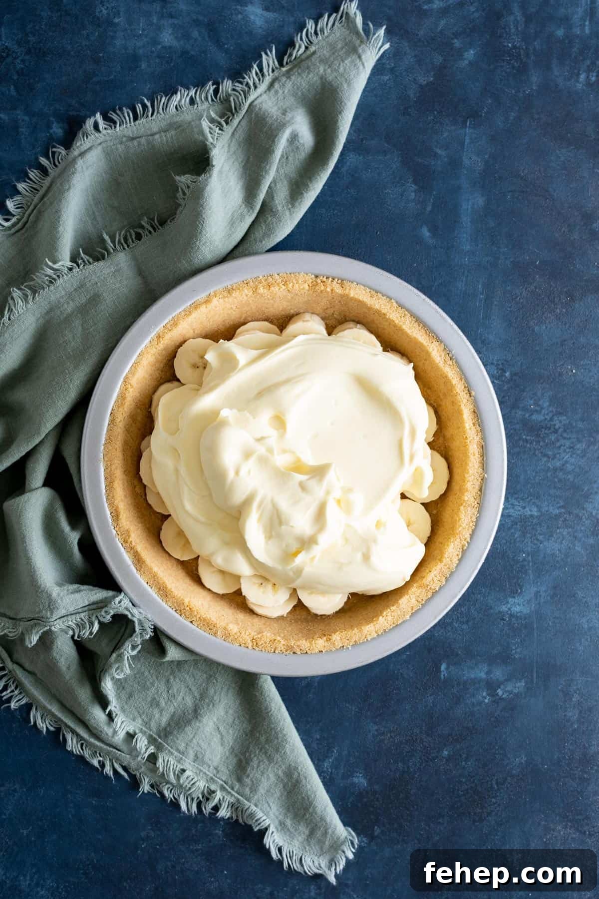 Vanilla Wafer Crust Recipe: Quick No-Bake Pie and Cheesecake Crust 8 A vanilla wafer pie crust with pie filling inside.
