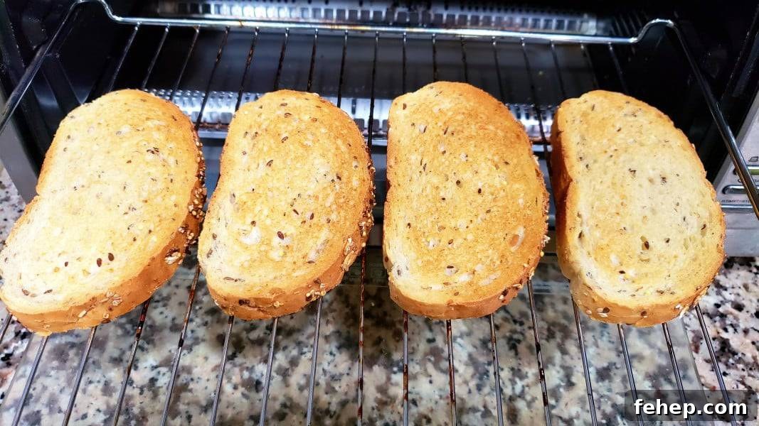 four slices of toasted artisan bread.
