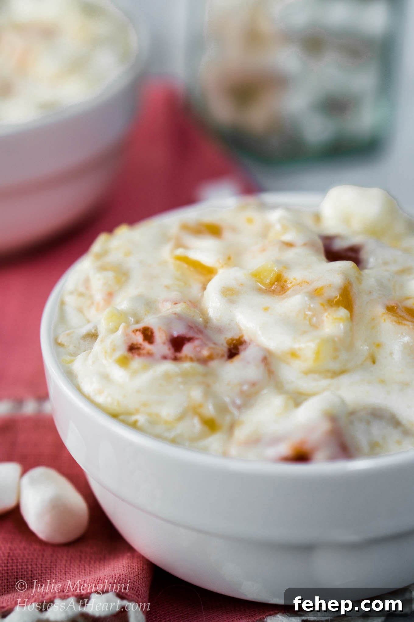 Simple 3-Step Leftover Turkey Casserole Recipe 6 Whipped cream salad with fruit cocktail and cherries in a white bowl