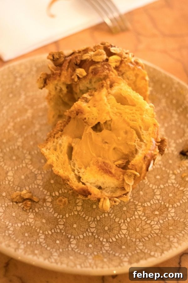 close-up of a caramel croissant - one of the foods in Paris that you must try!