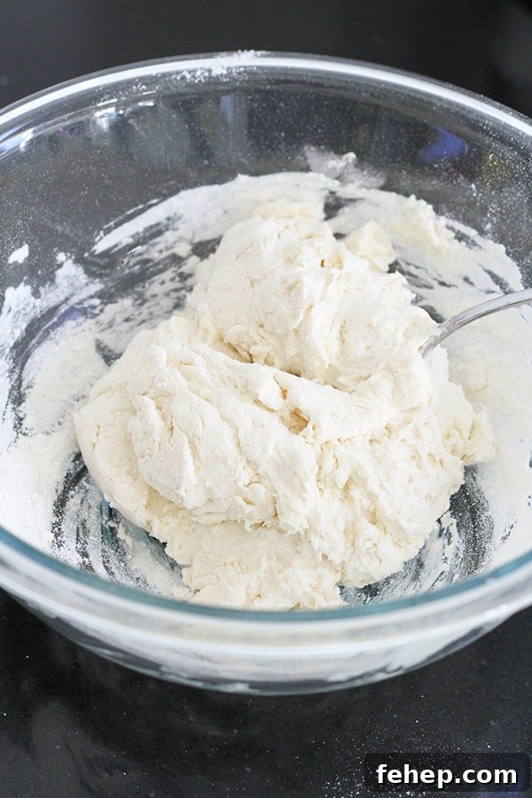 Cinnamon Sugar Pretzel Bites (Yeast-Free) 4 two ingredient dough in a glass bowl.