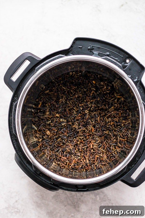 Fully cooked instant pot wild rice in an instant pot.