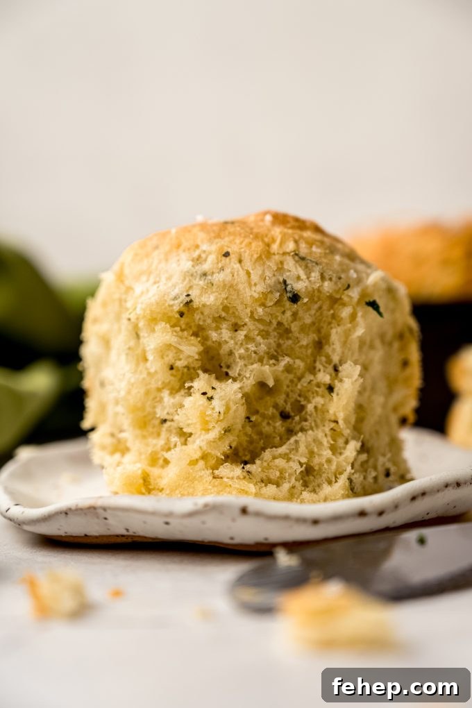 An herbed skillet roll on a plate.