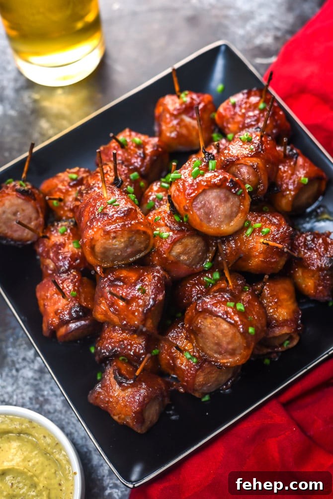Bacon-Wrapped Brat Bites with 5 Simple Ingredients 5 5 Ingredient Bacon-Wrapped Bratwurst Bites. Just wait til you see how easy these sweet, spicy, smoky appetizer bites are to make! | hostthetoast.com
