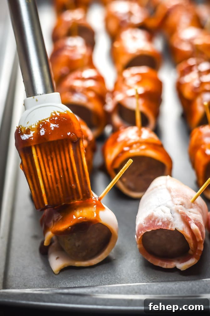 Bacon-Wrapped Brat Bites with 5 Simple Ingredients 6 5 Ingredient Bacon-Wrapped Bratwurst Bites. Just wait til you see how easy these sweet, spicy, smoky appetizer bites are to make! | hostthetoast.com