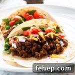 A close up view of lentil tacos on a plate.