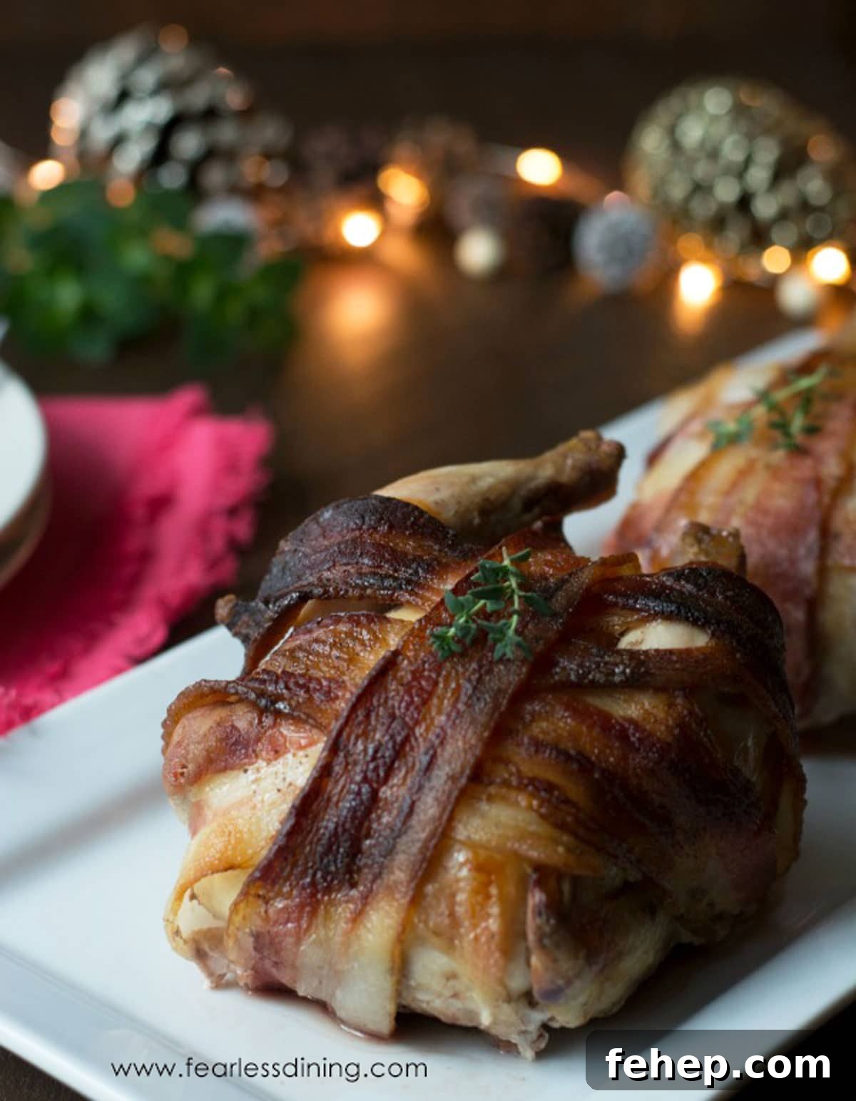 Bacon-Wrapped Cornish Hens with 3 Simple Ingredients 7 Bacon wrapped cornish hens on a platter.