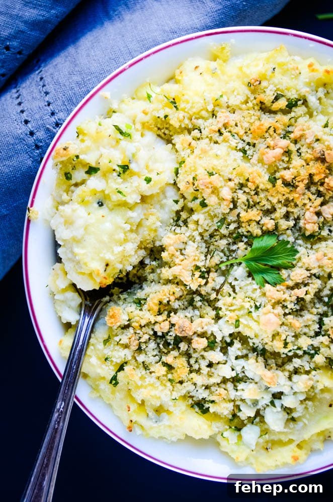 spooning up the soufflé with blue cheese recipe.