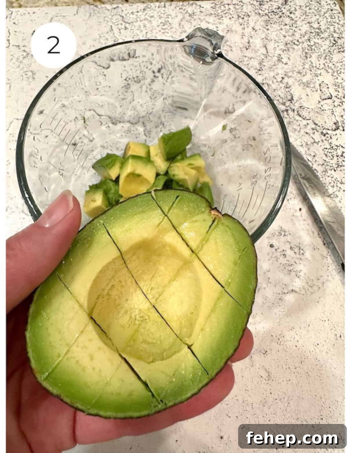 An avocado cut in half.