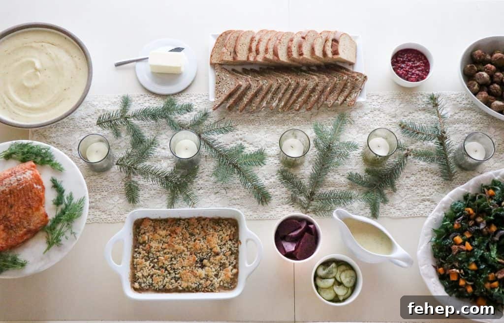Modern Scandinavian Christmas Eve Smorgasbord Menu Ideas 2 A table topped with food for a Scandinavian Christmas Eve smörgåsbord