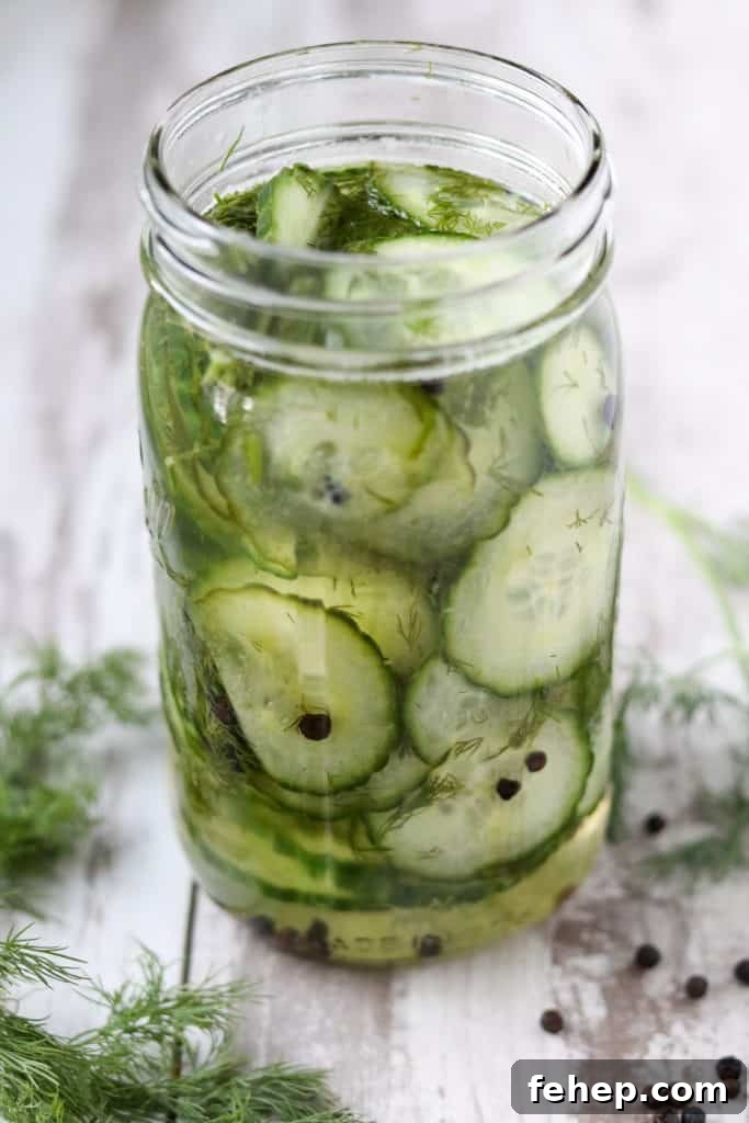 Modern Scandinavian Christmas Eve Smorgasbord Menu Ideas 11 A close up of fresh pickled cucumbers in a jar