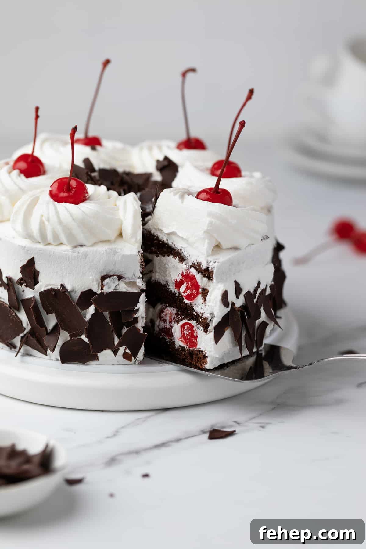 15 Irresistible Cake Recipes for Every Occasion 5 Assembled Black Forest cake on a serving platter.
