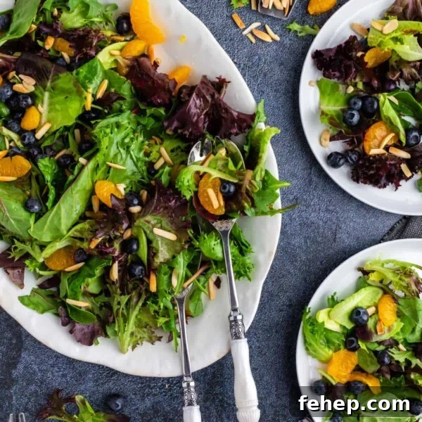 Creamy Bacon Ranch Potato Salad Recipe for Summer BBQs 12 A colorful salad with oranges and blueberries