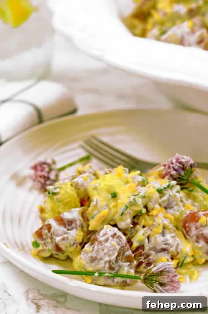 Creamy Bacon Ranch Potato Salad Recipe for Summer BBQs 6 Bacon Ranch Potato Salad on plate with fork