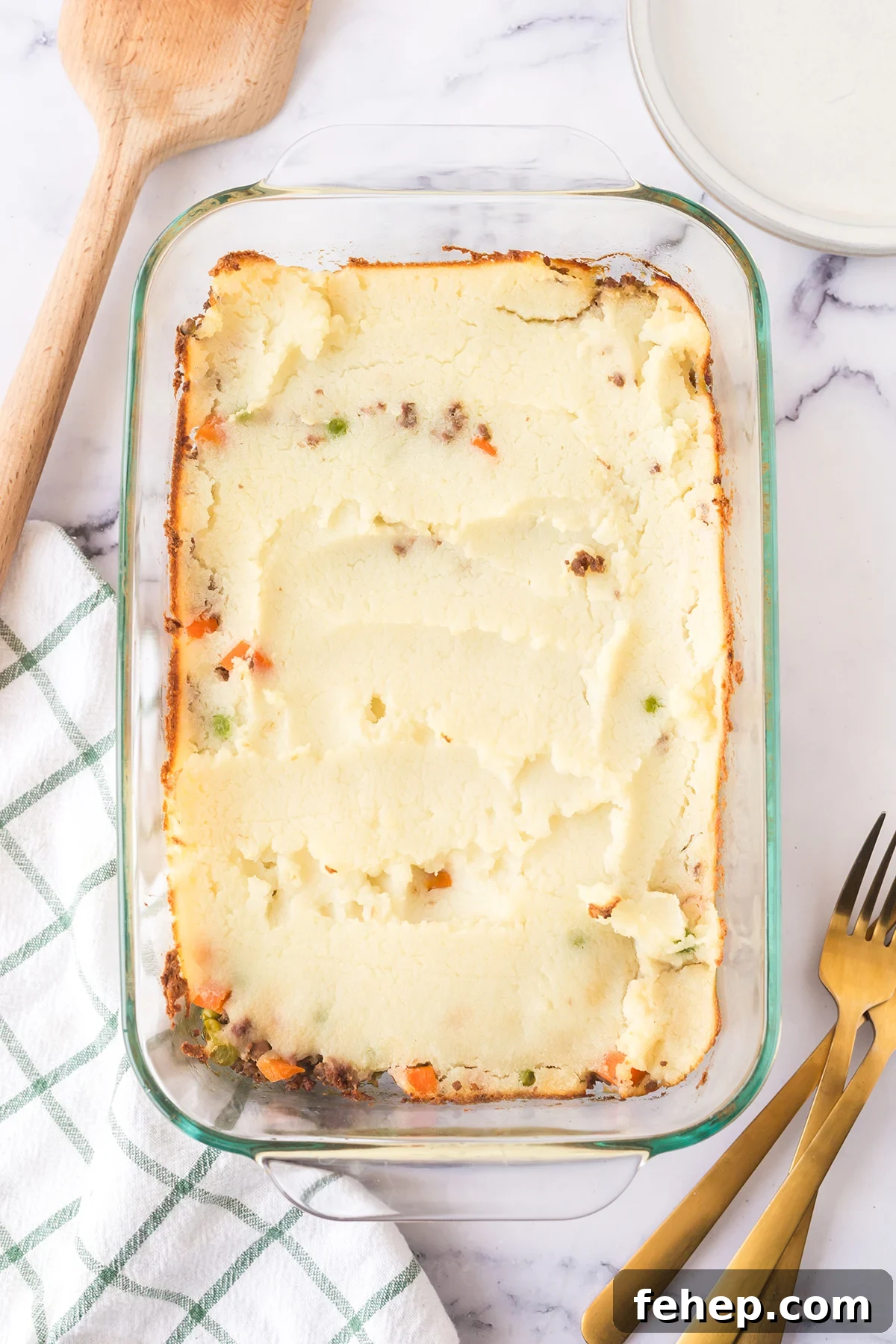 Baked Shepherds Pie in glass baking dish.