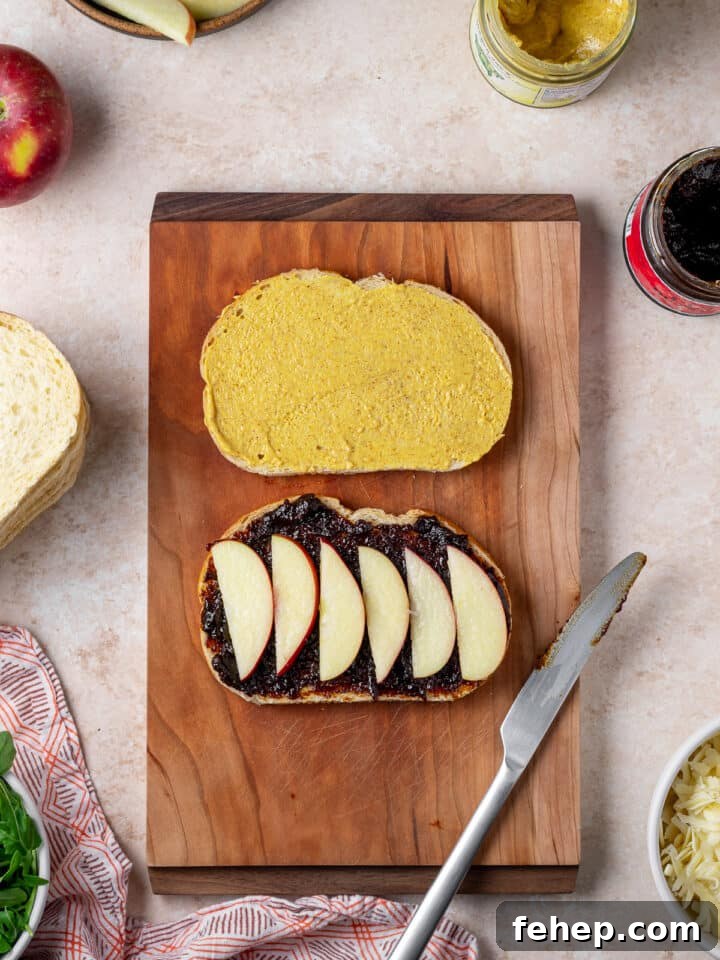 Gruyère Grilled Cheese with Fig Jam and Apple Slices 6 sliced apples placed on fig jam slice of bread