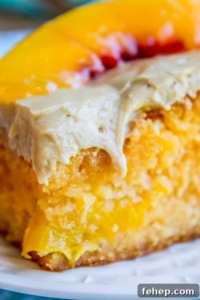 a slice of peach cake with brown sugar frosting.