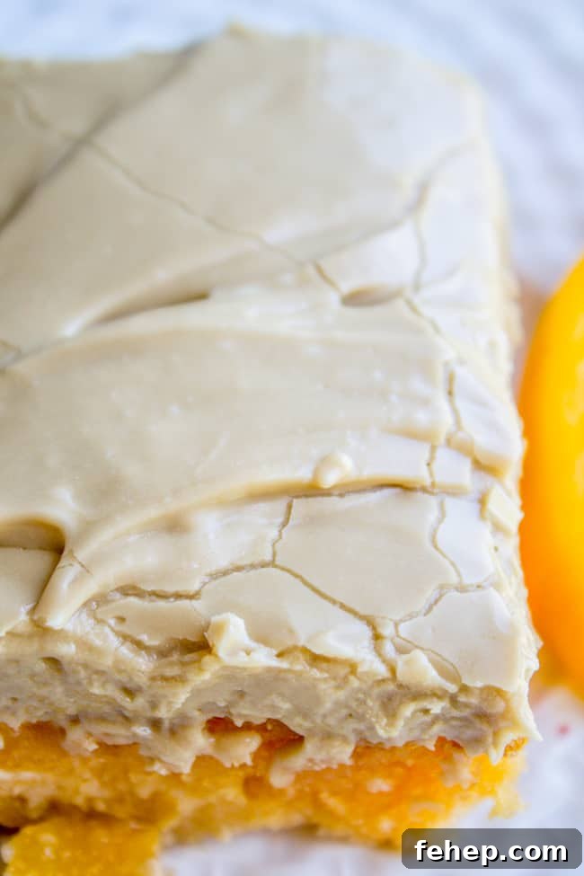 a peach cake with brown sugar frosting.
