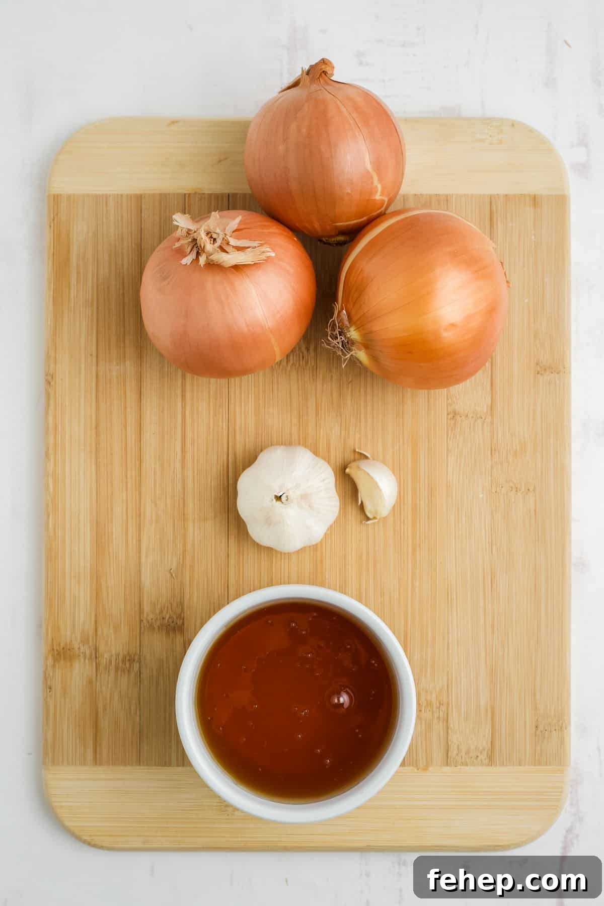 Homemade Honey and Onion Cough Syrup Recipe for Quick Relief 3 Ingredients on the table to make honey and onion cough syrup before cooking.