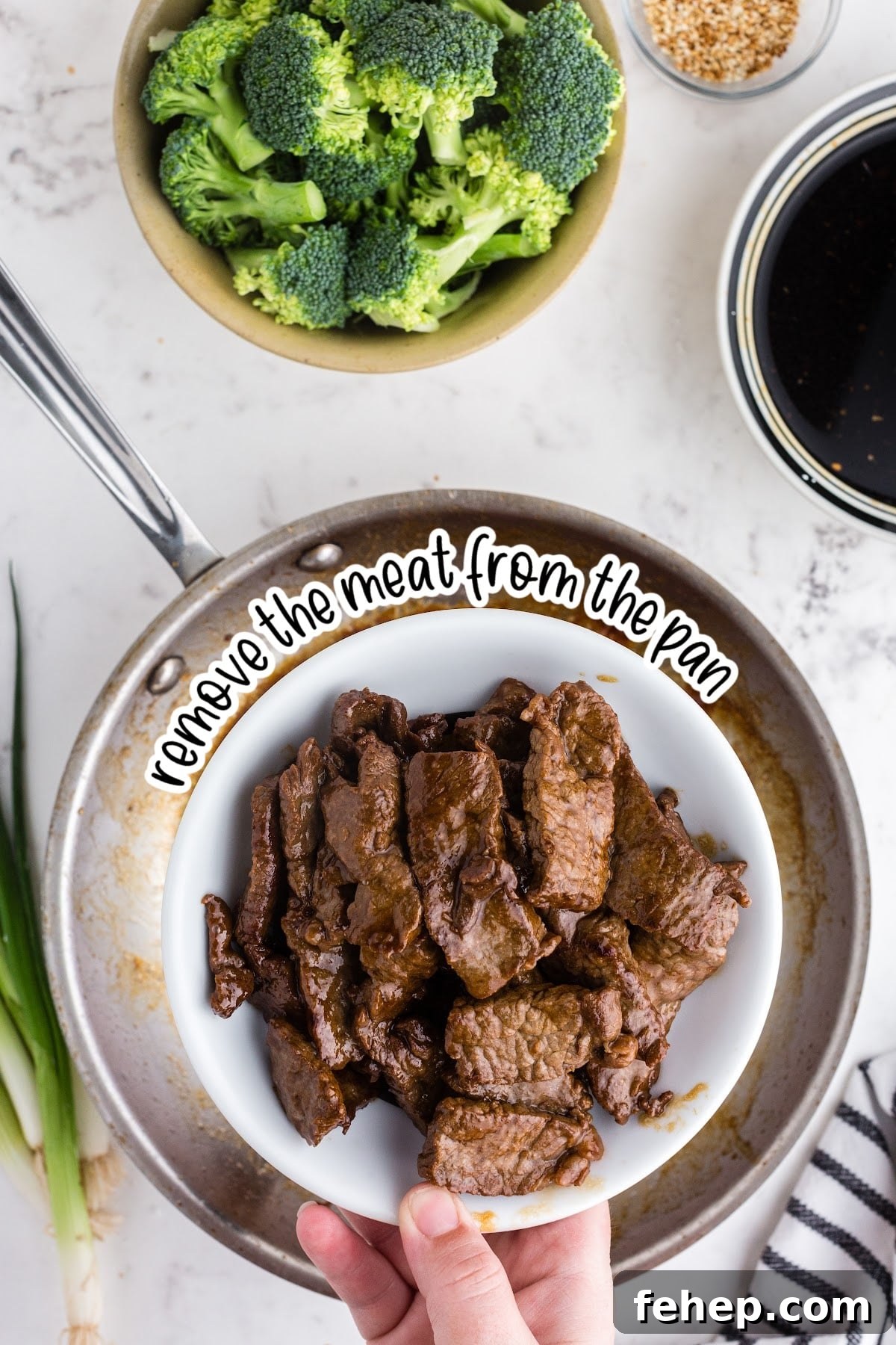 Panda Express Beef and Broccoli Recipe (Copycat Version) 7 Seared beef for Panda Express beef and broccoli on plate held over saute pan, with text "remove the meat from the pan."