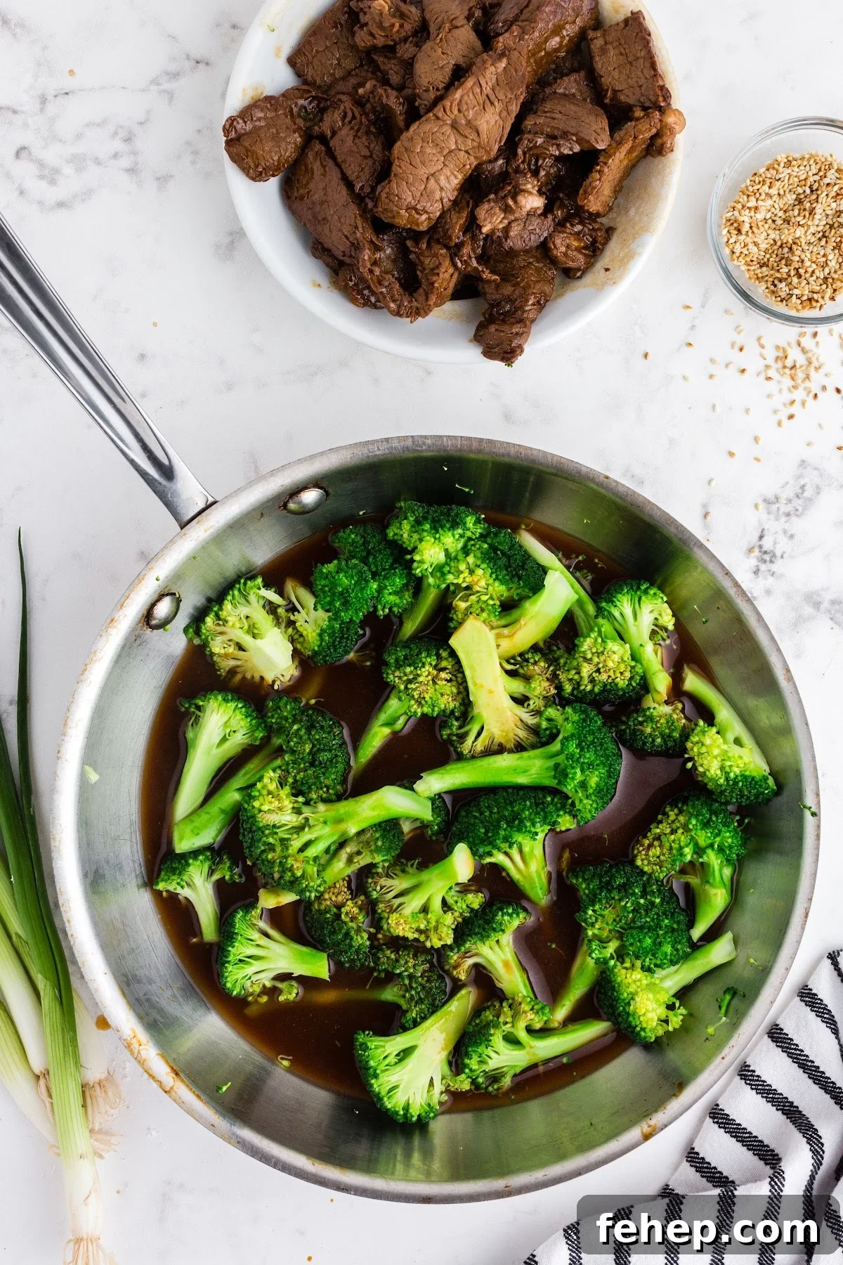 Panda Express Beef and Broccoli Recipe (Copycat Version) 9 Sauce added to skillet with broccoli; seared beef set aside.