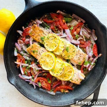 baked salmon in cast iron skillet.