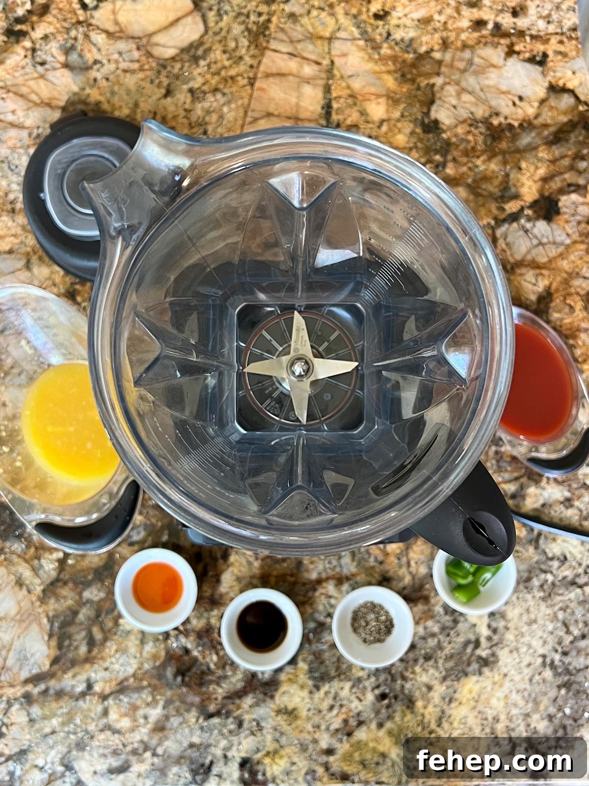 Sangrita: The Essential Mixer That Completes Tequila 5 Top down view of blender with ingredient ready to add in.