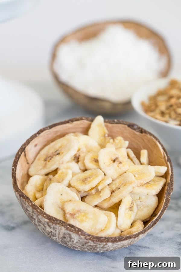 How to Make Stylish Coconut Bowls at Home 7 side shot of bowl with bananas in it
