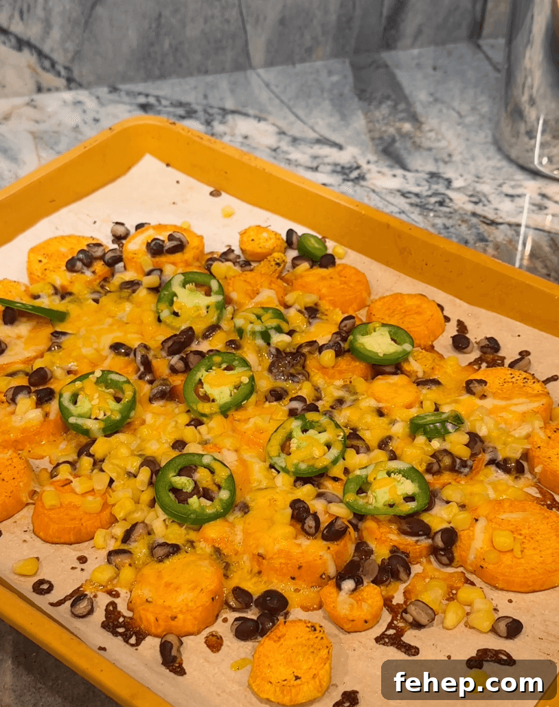 close up of sweet potato nachos on sheet pan