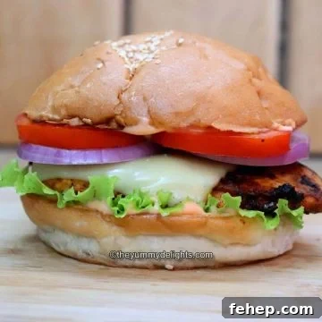 cajun chicken sandwiches placed on a board.