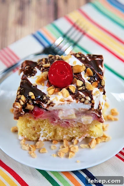 Banana Split Poke Cake slice
