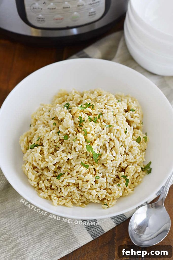 Perfect Instant Pot Brown Rice Recipe — Fluffy, Hands-Off Cook 7 brown rice in white serving bowl in front of instant pot pressure cooker