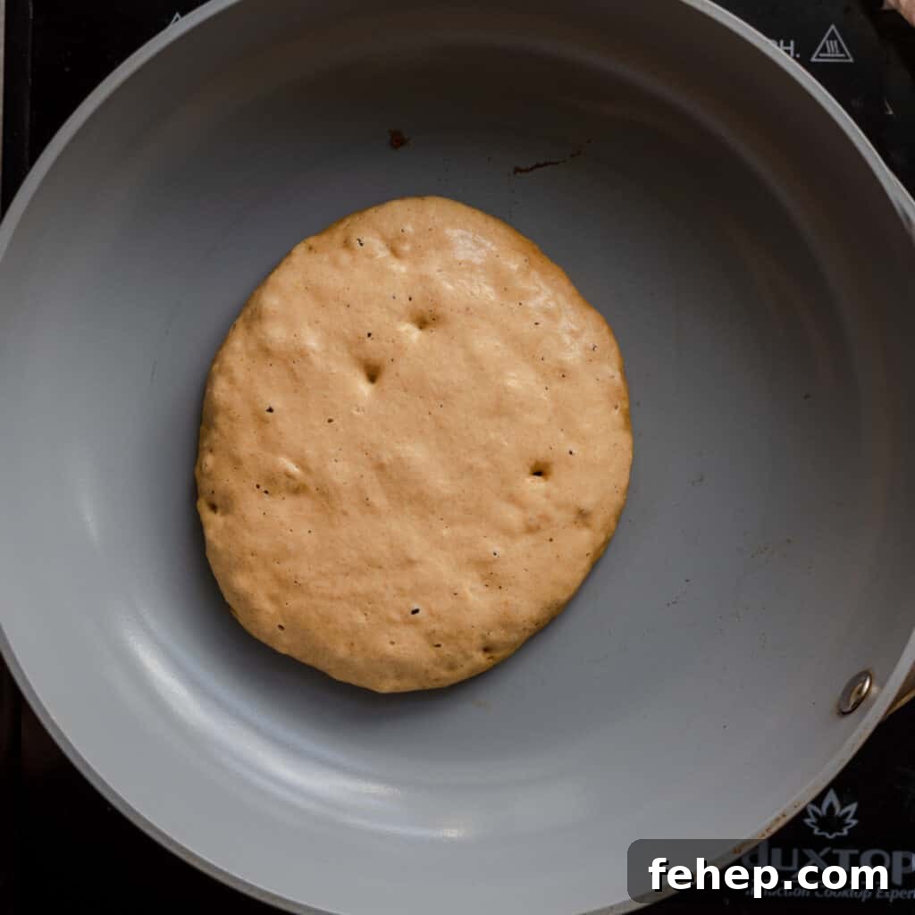 bubbles forming on pancake in skillet