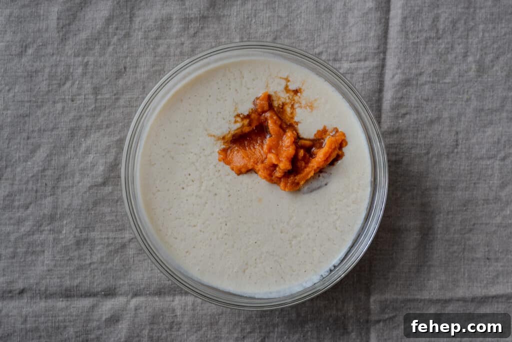 pumpkin puree in a bowl of buttermilk
