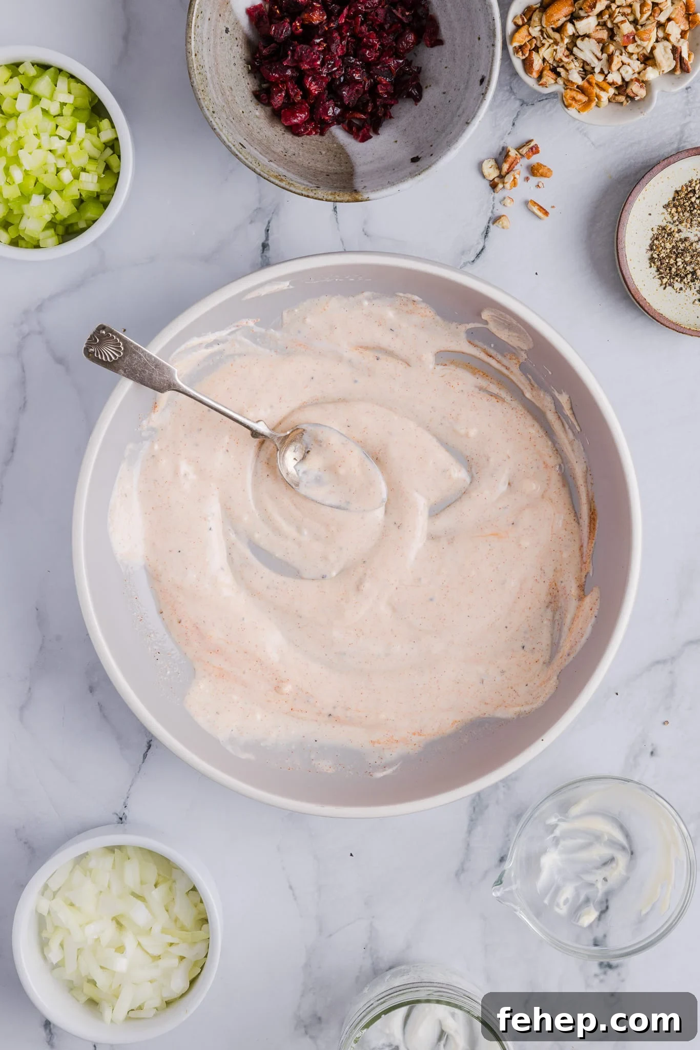 Classic Cape Cod Chicken Salad Recipe for Summer Lunches 5 Ingredients for Cape Cod chicken salad dressing mixed in a large bowl.