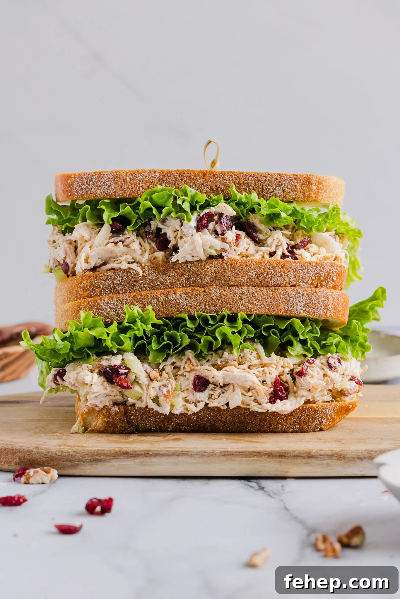 Classic Cape Cod Chicken Salad Recipe for Summer Lunches 8 Two sandwiches with Cape Cod chicken salad stacked on top of one another.