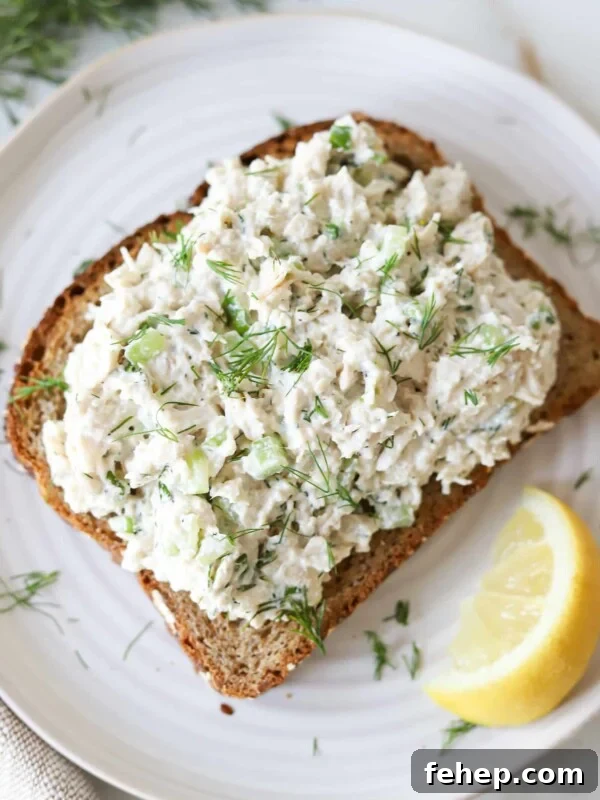 Classic Cape Cod Chicken Salad Recipe for Summer Lunches 9 Cottage cheese chicken salad on toast garnished with dill.