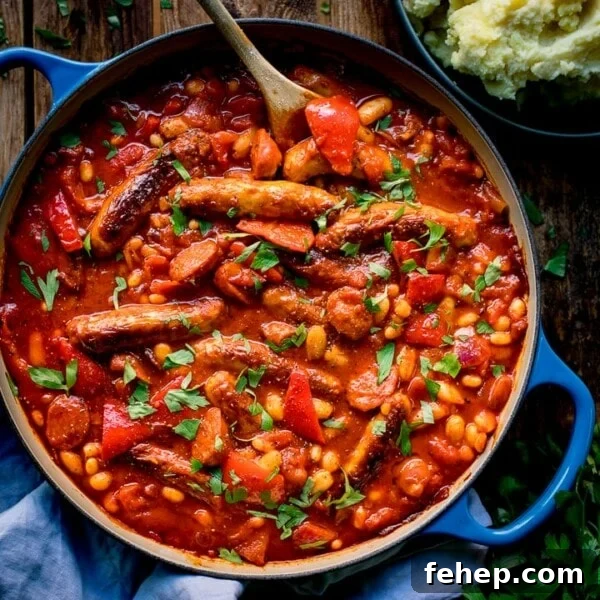 Sausage and bean casserole in a blue pan