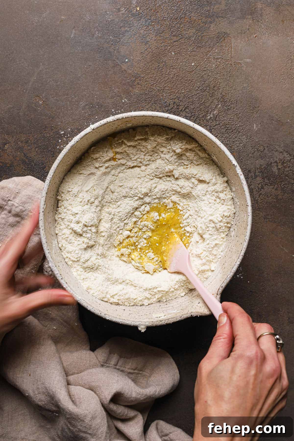 Italian Pasta Frolla Shortcrust Pastry: Multipurpose Dough Guide 10 Hands mixing eggs into a large bowl with flour.