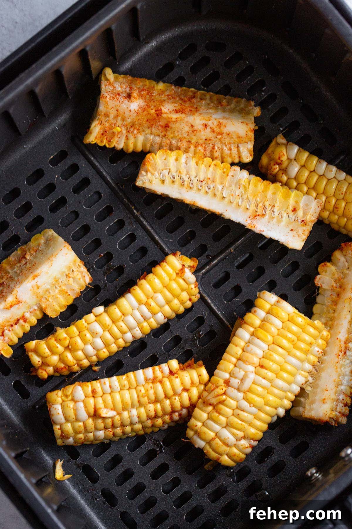Crispy Air Fryer Corn Ribs Recipe for Summer BBQs 7 Uncooked corn ribs in air fryer basket.