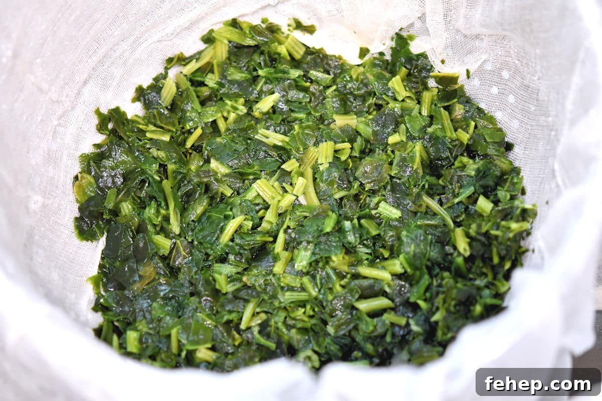 chopped spinach in a cheesecloth
