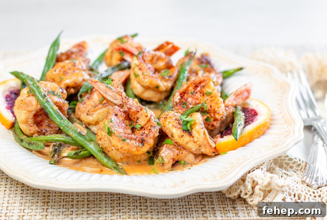 Skillet Chili Shrimp with Blackened Green Beans with Blood Orange Butter Sauce 