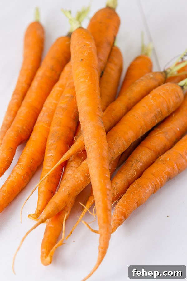 Hearty Tomato and Red Lentil Soup Recipe for Cozy Meals 4 long skinny carrots with their tops taken off